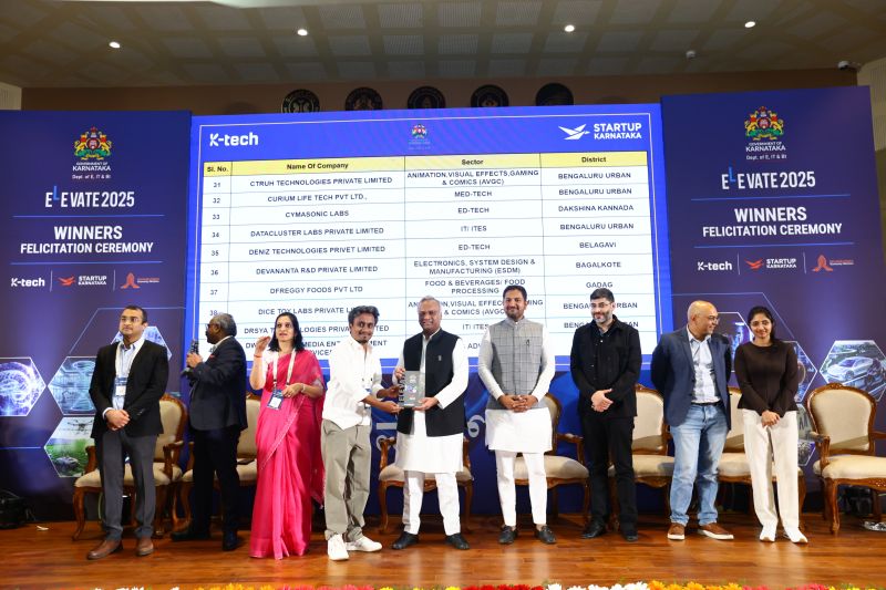 Calypsion Innovations receiving Elevate 2025 award from Shri Priyank Kharge, Hon. Minister for IT BT Department, Government of Karnataka